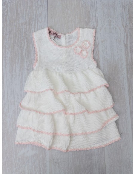 vestido de punto blanco con detalles rosa