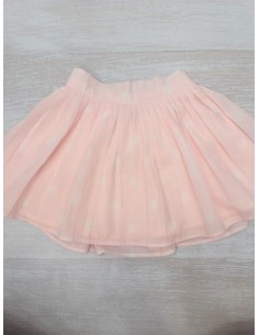 falda rosa con bolas blancas
