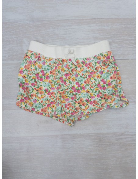 short blanco con flores naranja y rosadas