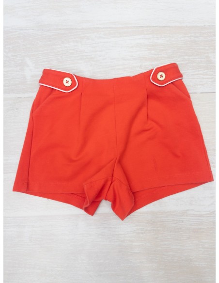 short rojo con dos botones