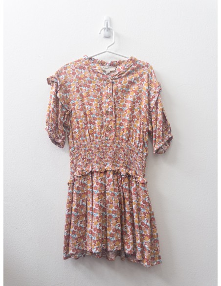 vestido blanco con flores mostaza y concho de vino