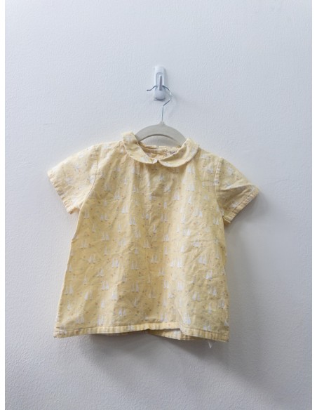 top amarillo con patitos