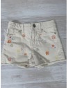 short beige con dibujos bordados