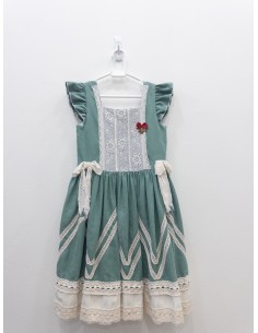 vestido verde con detalles beige