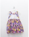 vestido morado con flores azules y pecho blanco