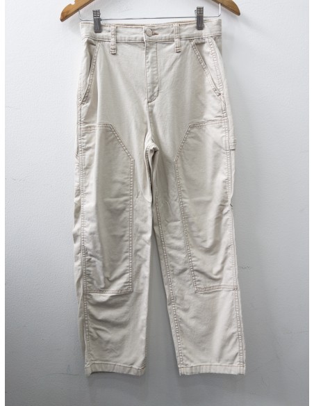 jean beige con bolsillos