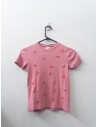 camiseta rosada con lazos rosados bordados
