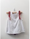 set short y top blanco con rojo brilloso