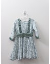 vestido blanco con flores verdes y fajin