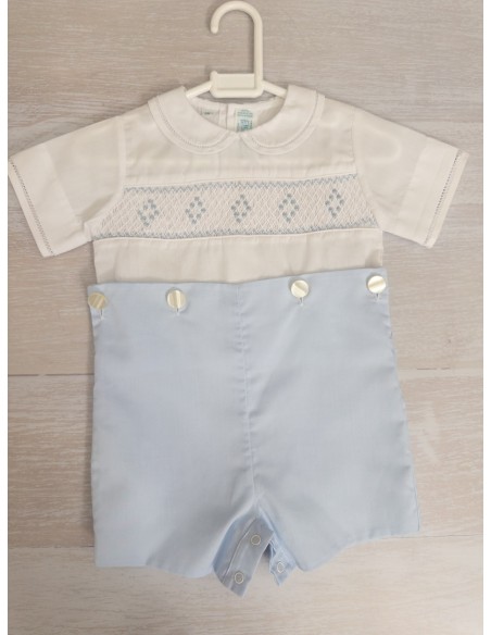 enterizo celeste con pecho blanco bordado celeste