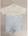 enterizo celeste con pecho blanco bordado celeste