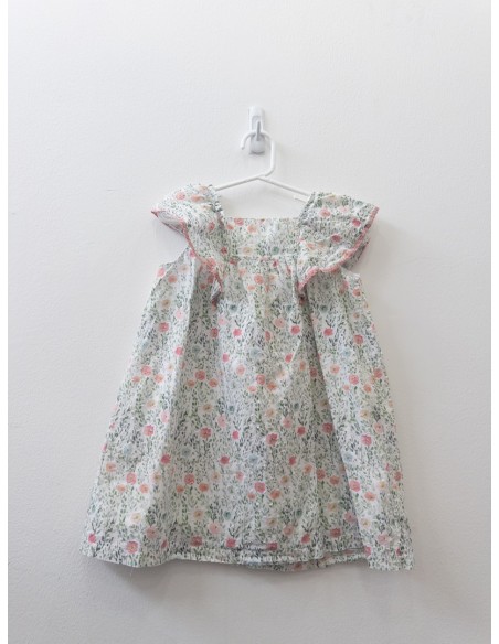 vestido sin mangas blanco con hojas verdes y flores rosadas