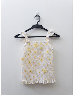 top y falda de margaritas