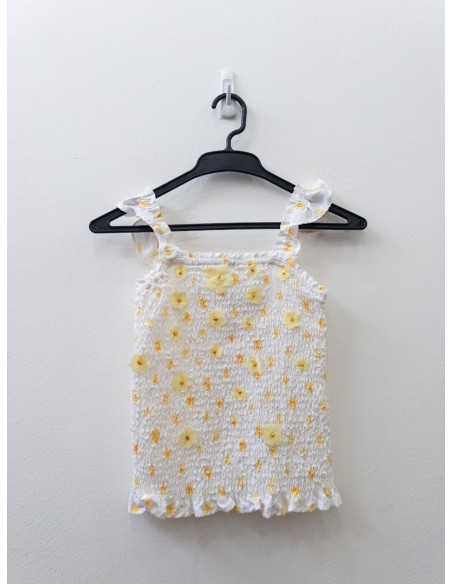 top y falda de margaritas