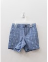 short azul con rayas blancas