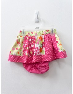 falda con calzon fucsia con bolas blancas y vere con flores