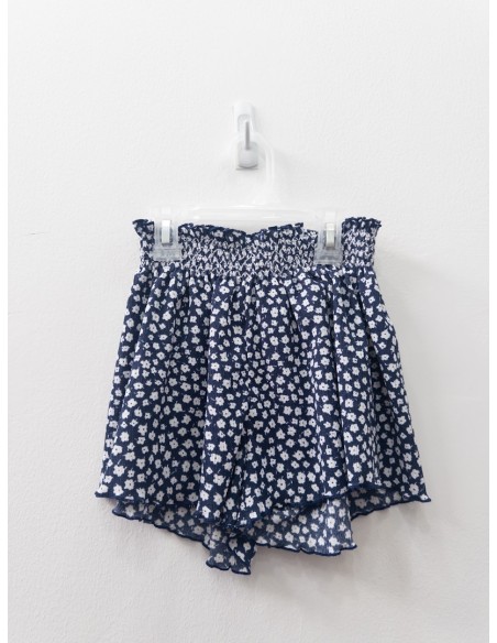 falda azul flores blancas