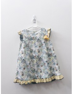 vestido blanco con flores verdes y amarillas