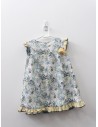 vestido blanco con flores verdes y amarillas