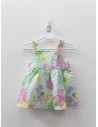 top turquesa con flores amarillas y rosadas