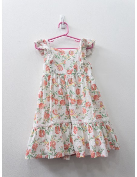 vestido con durazno y hojas verde